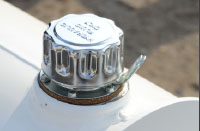 Locking Cap For Securing Fill Port