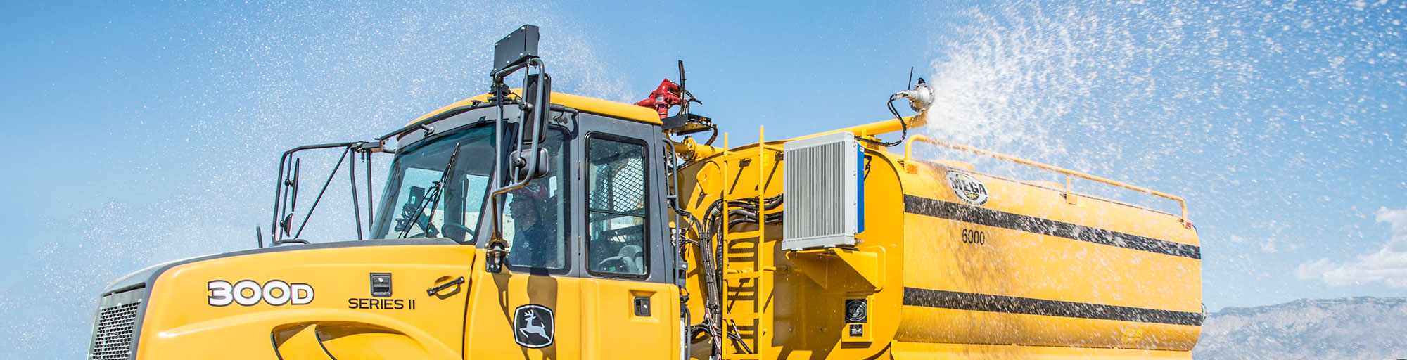 Articulated Truck Tanks - John Deere Banner